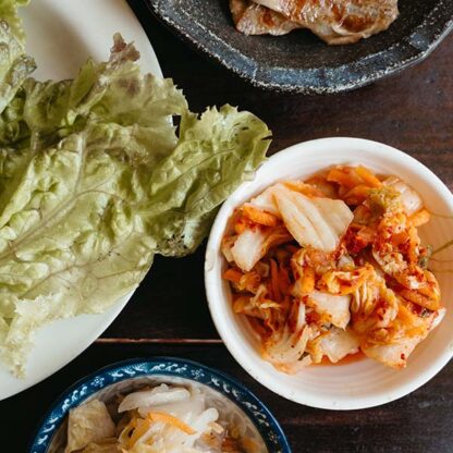 Ingredients for a kimchi pork and lettuce wrap