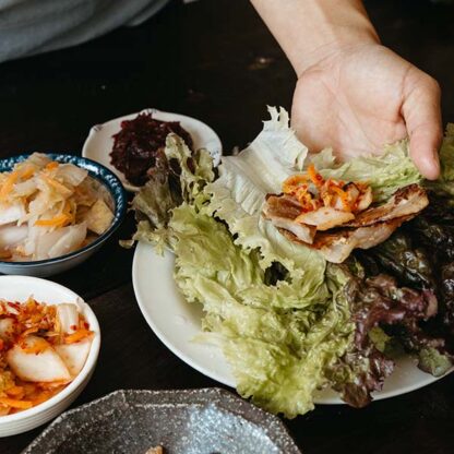 A kimchi and pork lettuce wrap